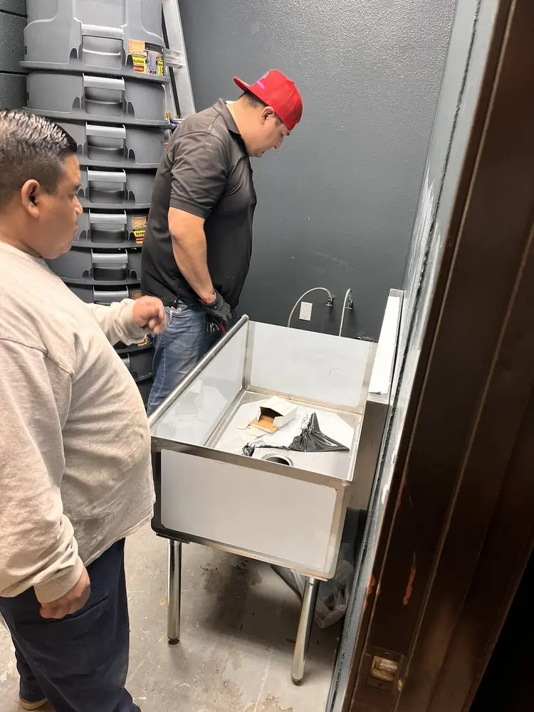 Commercial plumbing and sink installation in McDonald